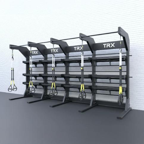 TRX Freestanding Bay – rig configured with medicine-ball targets, resistance bands, and battle-rope anchor