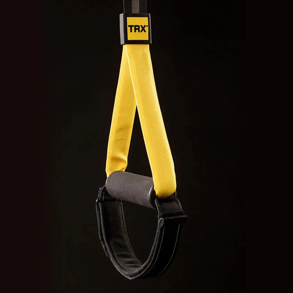 TRX Home2 System – door anchor attached, demonstrating quick setup in a standard doorway