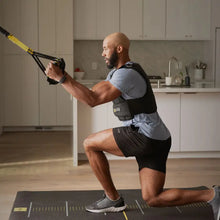 TRX Home2 System – black-and-yellow straps hanging vertically to show adjustable buckles for home workouts