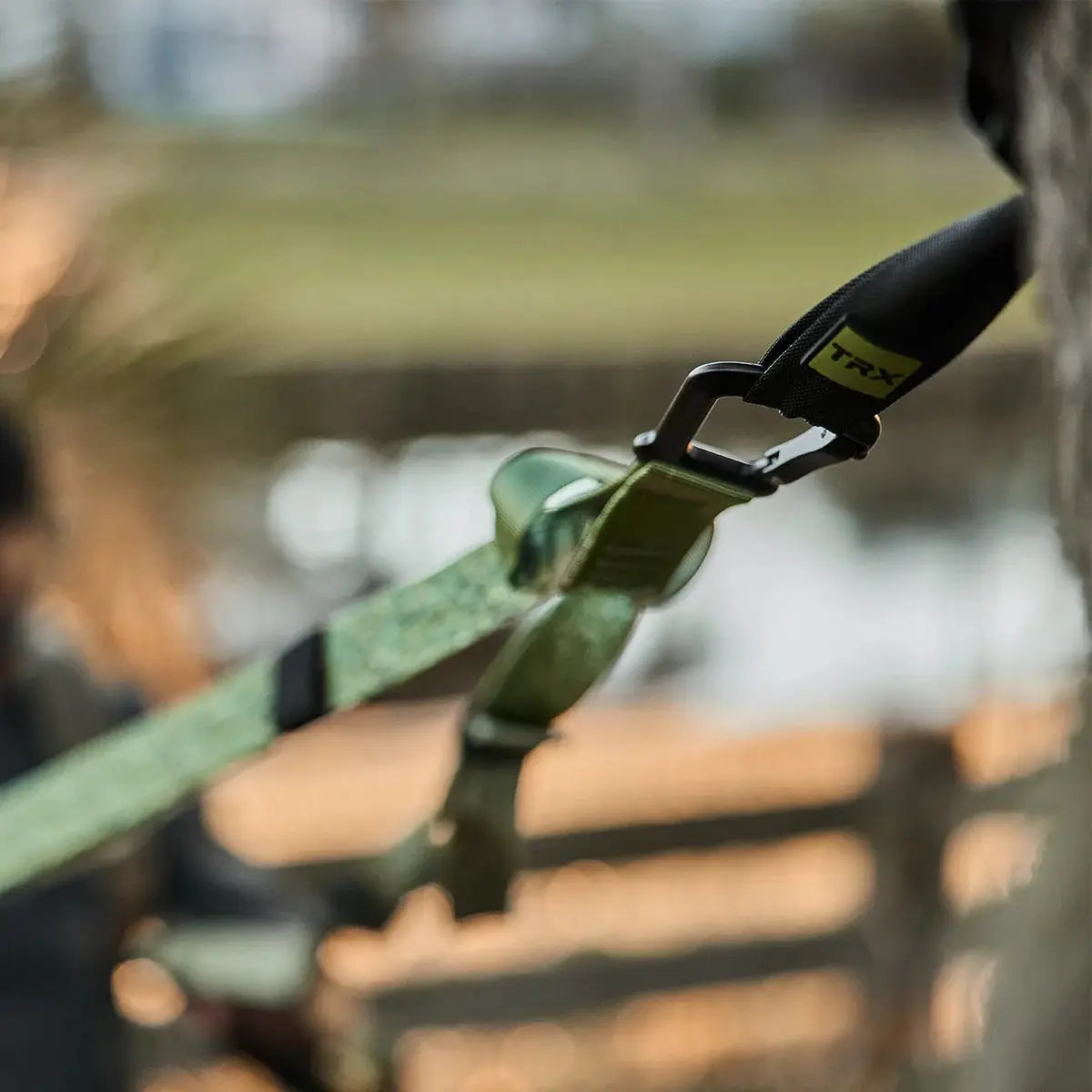TRX Pro4 Suspension Trainer – rolled camouflage straps showing quick-adjust buckles and reinforced webbing