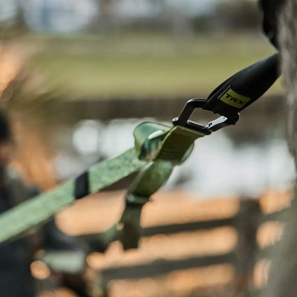 TRX Pro4 Suspension Trainer – rolled camouflage straps showing quick-adjust buckles and reinforced webbing