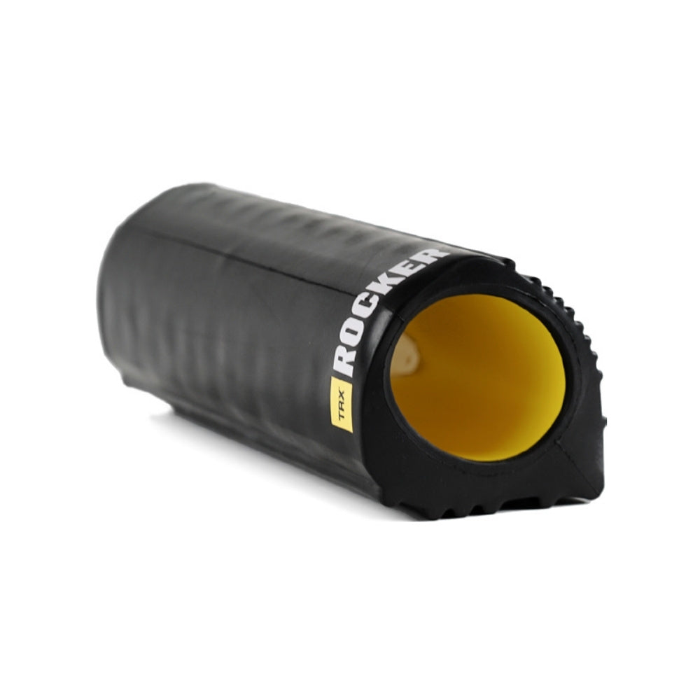 TRX Rocker foam roller, black exterior with yellow interior.