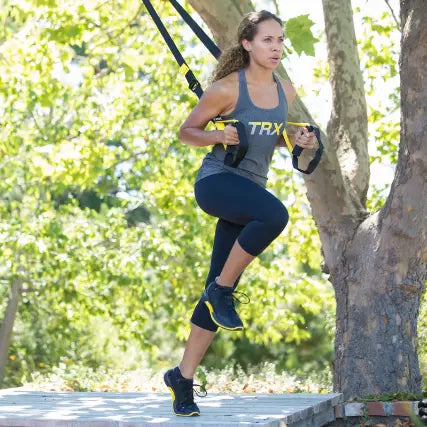 TRX Strong Suspension Trainer – kit displayed with mesh carry bag and all included accessories