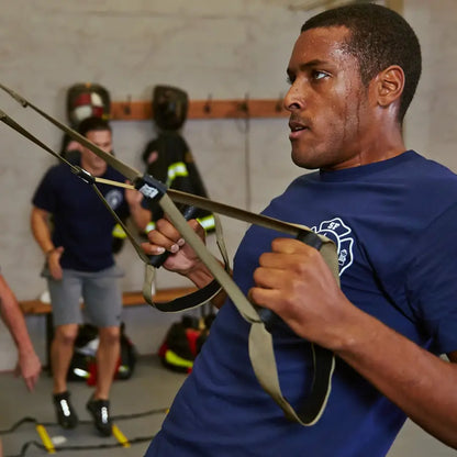TRX Tactical Suspension Trainer – angled shot showing reinforced stitching and rugged cam buckles