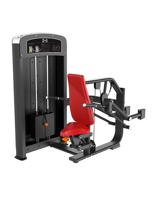 Tricep press machine with red seat and side handles.