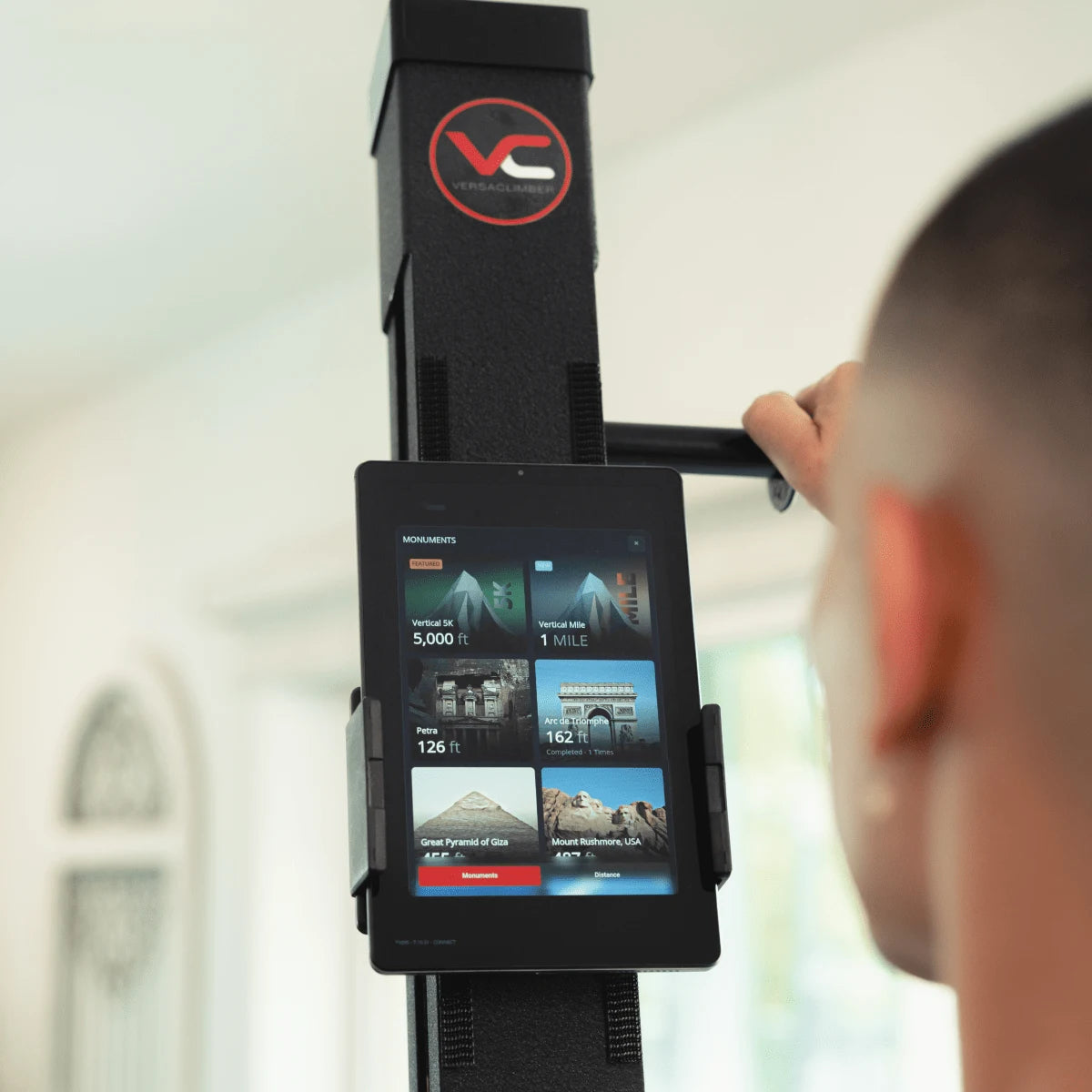 VersaClimber Home – close lifestyle shot of user performing intense climb exercise