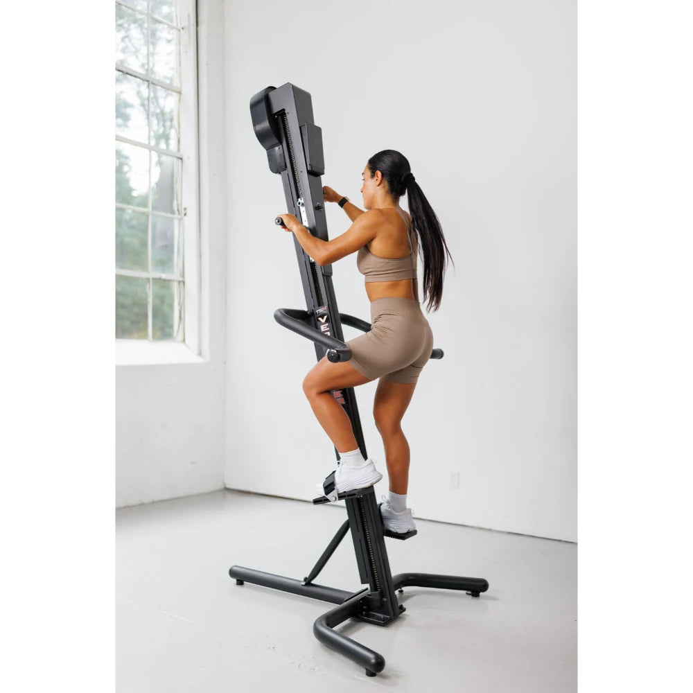 VersaClimber TS Magnetic – action shot capturing motion blur of climber workout for marketing