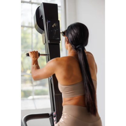 VersaClimber TS Magnetic – close-up lifestyle shot of handle and rail during intense vertical climb