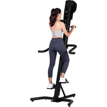 VersaClimber SM Magnetic – woman exercising on SM Magnetic climber demonstrating low-impact cardio