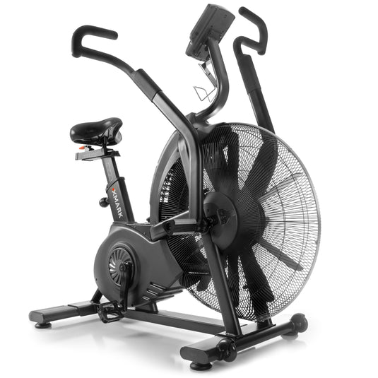 Black air bike with a large front fan, padded dual handlebars, and compact frame.
