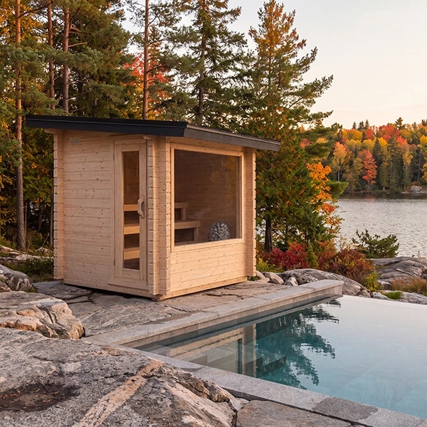 Dundalk Leisurecraft CT Avalon Sauna beside a lakeside pool