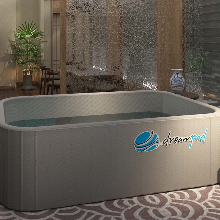 Dreampod Home Float Flex, a modern and stylish floatation pod, set in a serene indoor environment with plants and decorative elements.