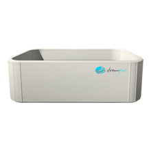 Dreampod Home Float Flex, a modern, rectangular floatation pod in a light color with a textured surface and the Dreampod logo.