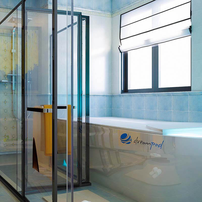 A modern bathroom featuring a glass shower enclosure and a Dreampod Home Float Pro bathtub with a sleek design and the Dreampod logo visible.