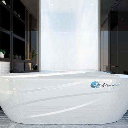 Dreampod Home Float Pro, a sleek white floatation pod, showcased in a modern interior setting with minimalistic decor.