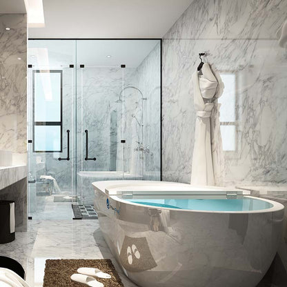 A modern bathroom featuring a sleek Dreampod Home Float Pro bathtub, marble walls, a glass shower enclosure, and a plush rug, creating a luxurious and serene atmosphere.