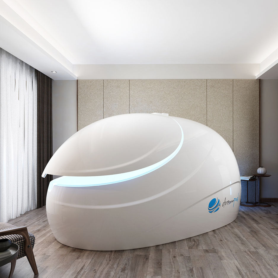 Dreampod Sport Float Pod in a modern room with wooden flooring and soft lighting.