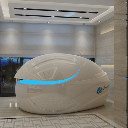 Dreampod V-Max Float Pod displayed in a modern, well-lit interior space with sleek design and ambient lighting.