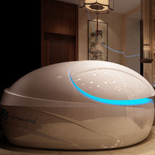 Dreampod V-Max Float Pod in a serene interior setting with soft lighting and decorative elements.