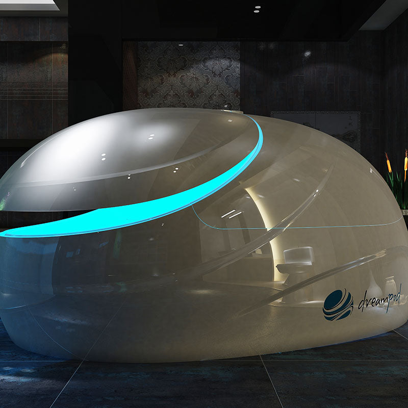 Dreampod V2 Float Pod displayed in a modern interior setting, featuring a sleek design with a glowing blue accent.