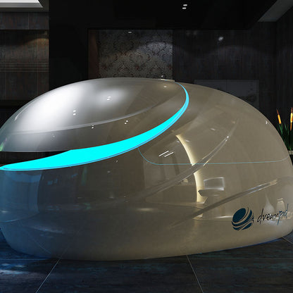 Dreampod V2 Float Pod displayed in a modern interior setting, featuring a sleek design with a glowing blue accent.