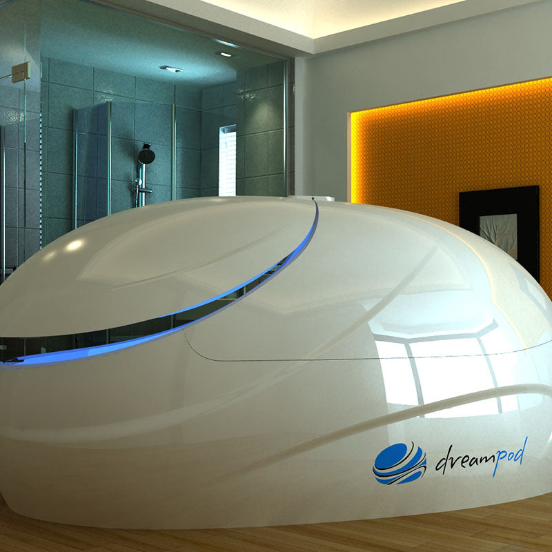 Dreampod V2 Float Pod in a modern interior setting, featuring a sleek, white design with blue lighting accents.