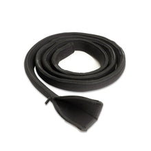 A rolled black neoprene zipper strap, showcasing its flexibility and smooth zipper closure.
