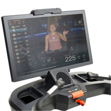 Close-up view of the Echelon Stride-7S Commercial Treadmill console featuring a large screen displaying a fitness instructor waving, along with workout statistics and a leaderboard.
