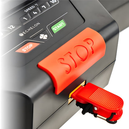 Close-up view of the control panel on the Echelon Stride-7S Commercial Treadmill, featuring the red 'STOP' button and safety key.