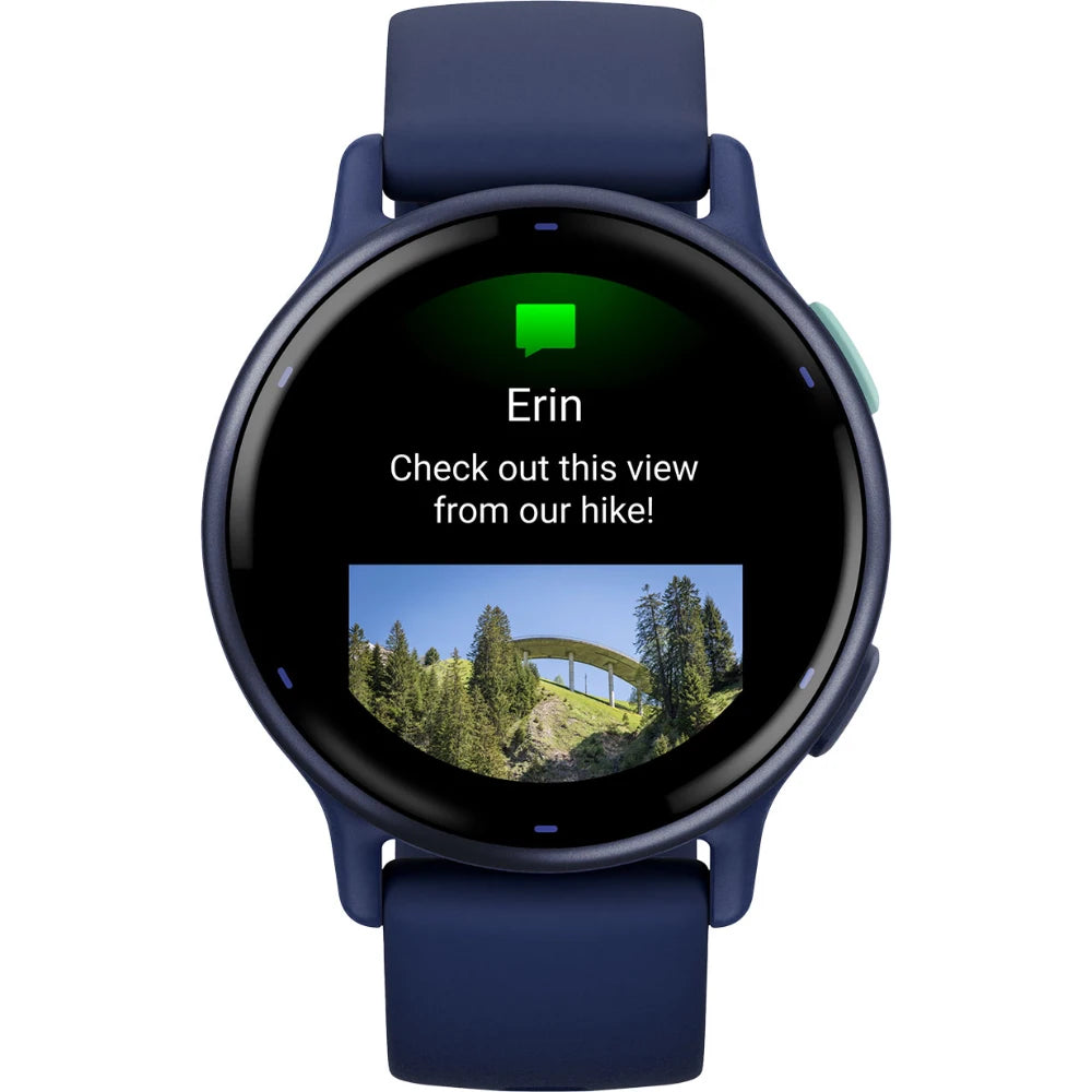 Smartwatch displaying a message from Erin with the text 'Check out this view from our hike!' and a small image of a scenic landscape featuring trees and a bridge.