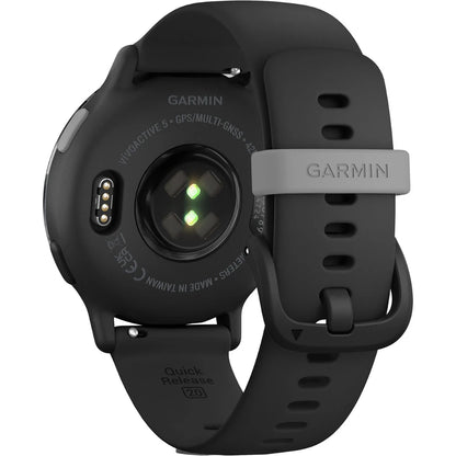 Close-up view of the back of a Garmin Vinoactive 5 smartwatch, highlighting the heart rate sensors and charging contacts, with a black silicone strap featuring a quick-release mechanism.