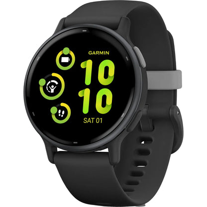 A Garmin smartwatch displaying a digital interface with green icons and numbers, showing the time as 10:10 and the date as Saturday, the 1st. The watch has a black strap and a sleek design.