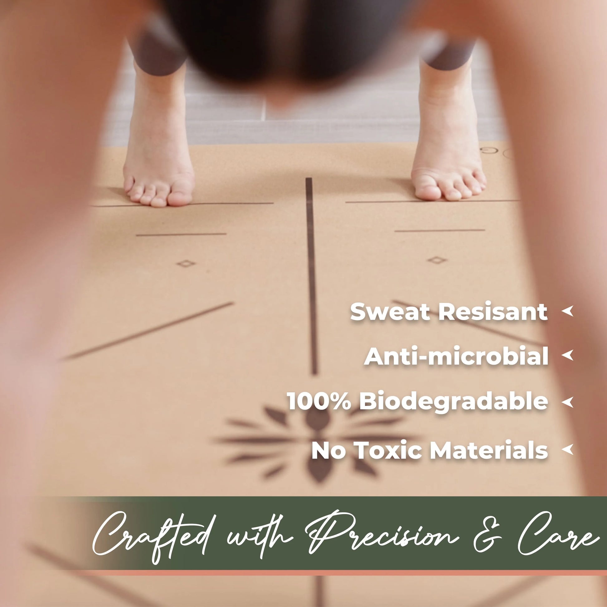 Overhead view of a person standing barefoot on a light tan cork yoga mat with alignment markings and a center line visible.