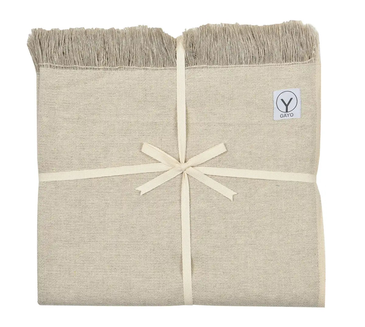 Cream-colored yoga blanket with textured hemp and organic cotton weave, fringed edges, tied with cream ribbon, and Gayo brand label visible.