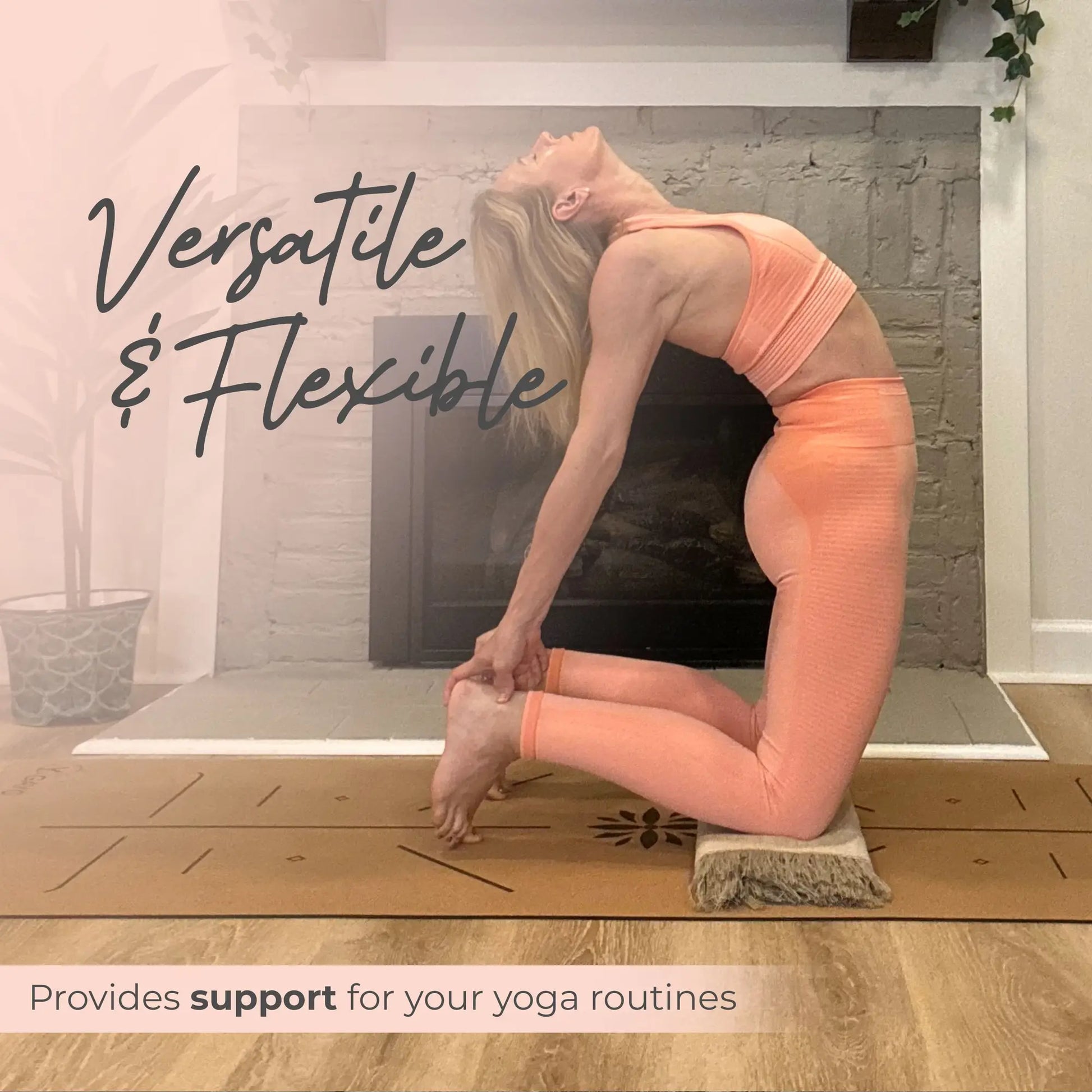 Woman performing a backbend yoga pose on a wooden floor using a folded peach-colored hemp and organic cotton yoga blanket for support.