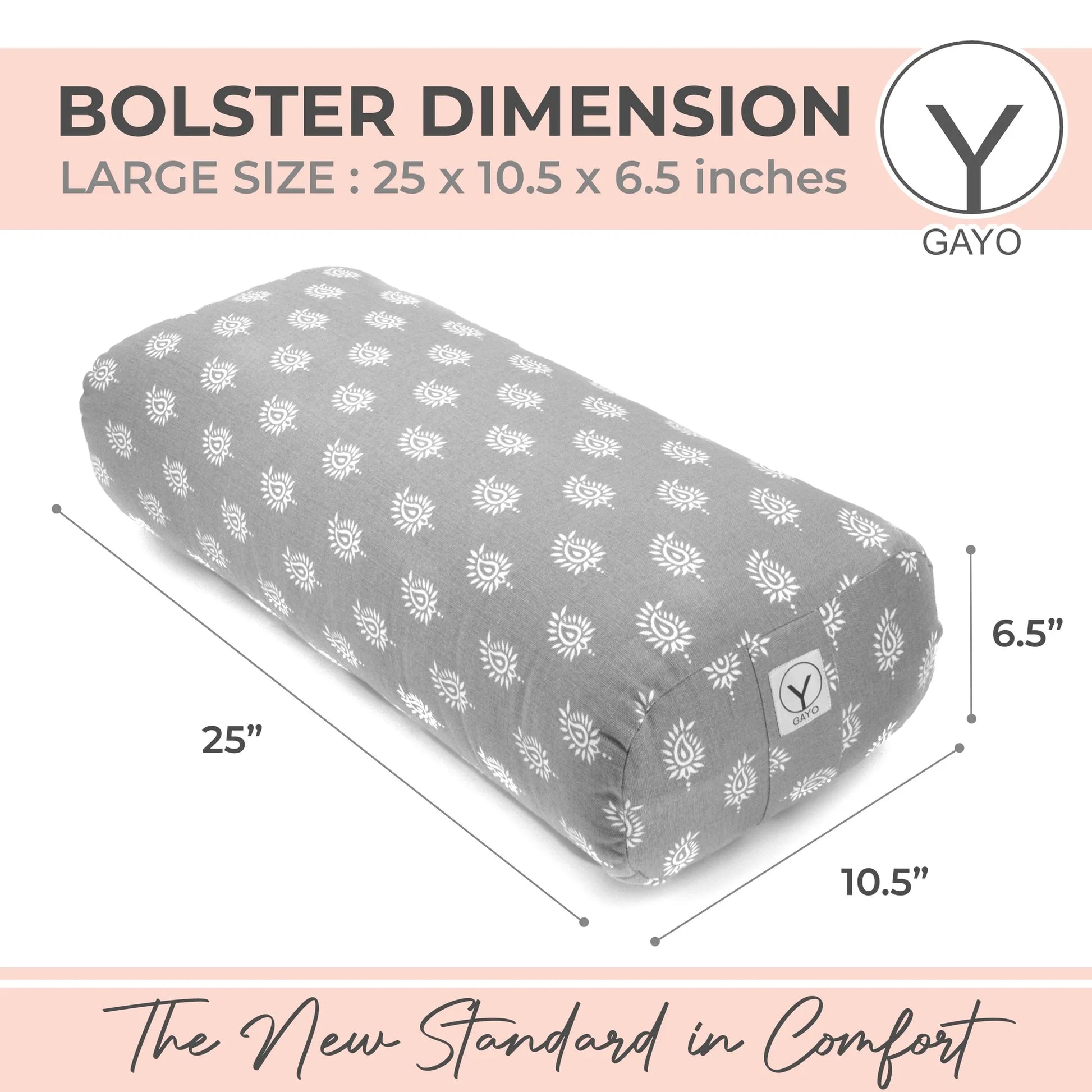 Cylindrical yoga bolster in gray with white sun motifs, measuring 25 x 10.5 x 6.5 inches. Small Gayo brand label visible on the side.