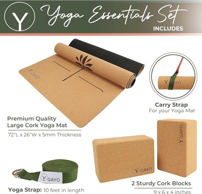 Cork yoga mat in natural tan with lotus design and black underside, rolled and displayed next to a green fabric yoga strap, a green carry strap with leather accent, and two rectangular cork yoga blocks. Set includes 72"L x 26"W mat, 10-foot yoga s...