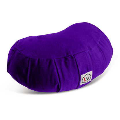 Purple bean bag cushion with a white fabric label.
