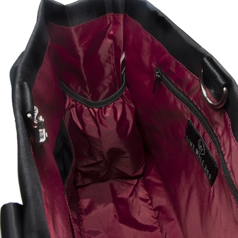 Black bag interior with burgundy lining, pockets and a zipper.