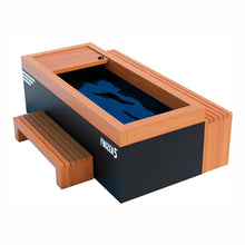 A modern ice bath with a wooden top and black base, featuring a bench on the side and a water-filled interior, labeled with 'FROZEN 5' branding.