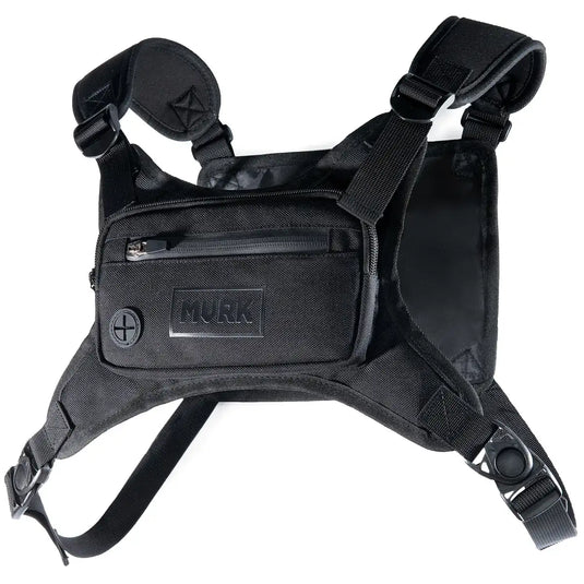 Black tactical vest with 'MVRK' branding on a white background