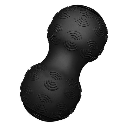 Black massage ball with a unique textured surface, shaped like a peanut, designed for muscle relief and trigger point therapy.