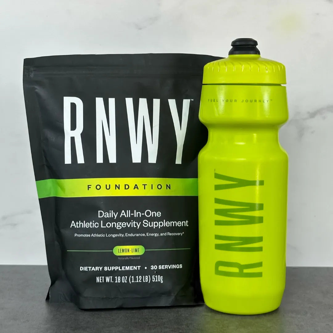 Bright neon yellow sports water bottle with black cap next to black pouch labeled "RNWY Foundation" lemon-lime flavored dietary supplement, displayed on gray surface.