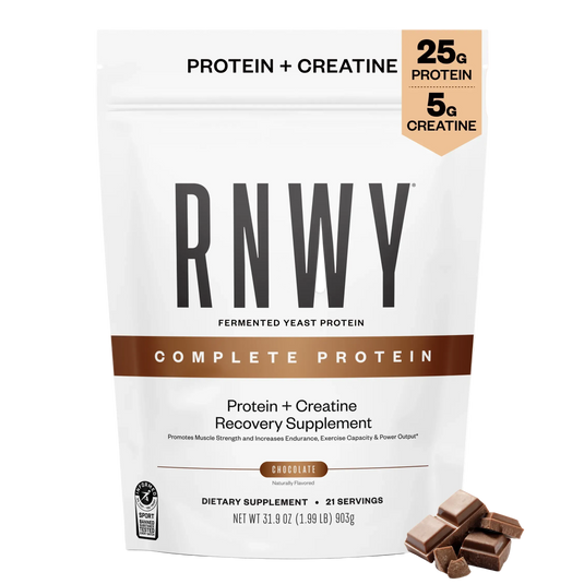White resealable pouch of RNWY fermented yeast protein powder in chocolate flavor, displaying 25g protein and 5g creatine per serving, with chocolate pieces shown in the lower right corner.
