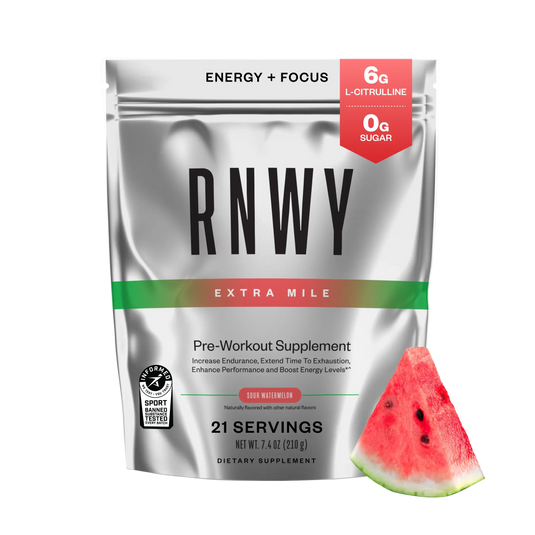 RNWY Extra Mile pre-workout supplement powder in sour watermelon flavor, silver pouch with red and green accent stripe, shown with fresh watermelon slice and nutrition callouts for 6g L-citrulline and 0g sugar.