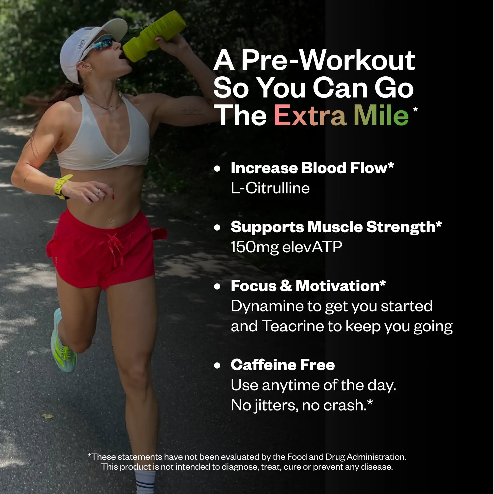 Woman drinking from a neon yellow bottle while jogging outdoors, wearing a white cap, light gray sports bra, and red shorts with neon yellow sneakers.