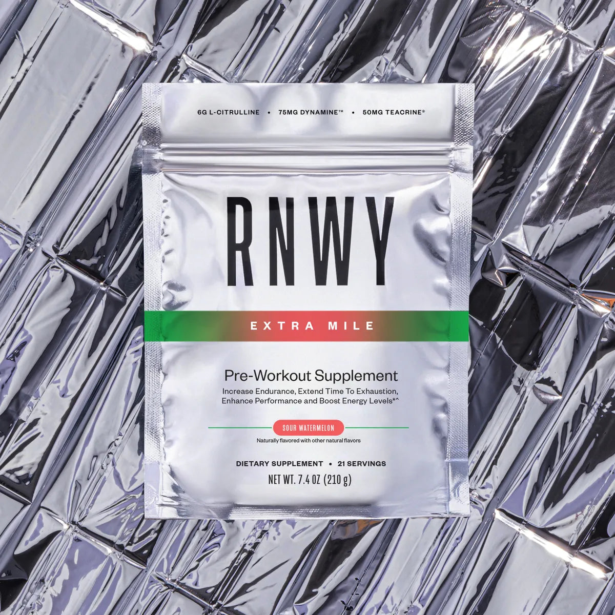 Silver resealable pouch of RNWY Extra Mile pre-workout supplement in sour watermelon flavor, containing 21 servings, displayed on a metallic reflective background.