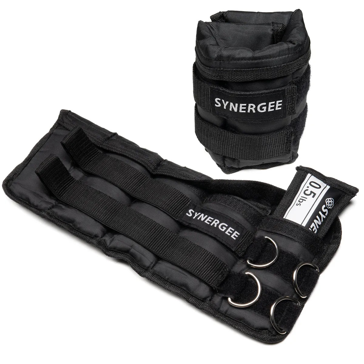 Pair of black adjustable ankle and wrist weights by Synergee with metal D-rings and carrying bag. Weights feature velcro closures and neoprene padding.
