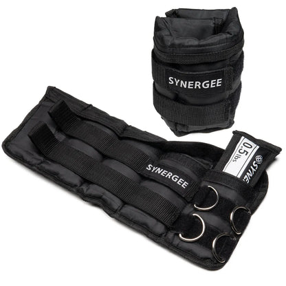Pair of black adjustable ankle and wrist weights by Synergee with metal D-rings and carrying bag. Weights feature velcro closures and neoprene padding.