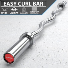 Chrome easy curl bar with wavy grip and chrome collars on a concrete background. Bar weighs 19 lbs with 28mm diameter and 450 lb capacity.